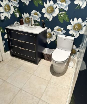 Remodeled bathroom by Peak Performance Construction LLC